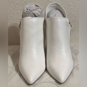 EUC Katherine Booties with wooden Heel size 10 White
**CALL OUT ON LEFT SHOE**